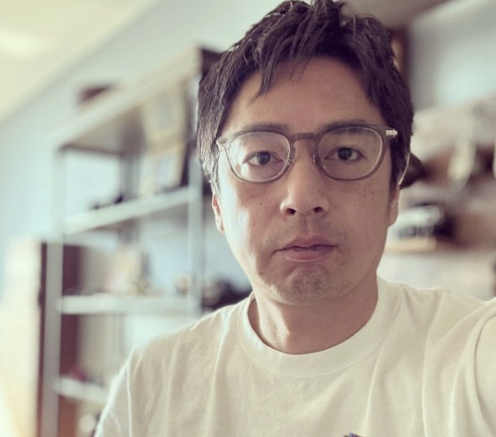 徳井義実